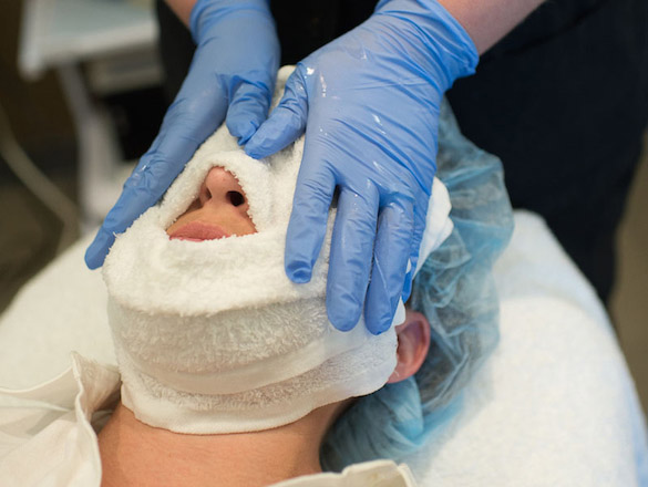 Woman receiving facial