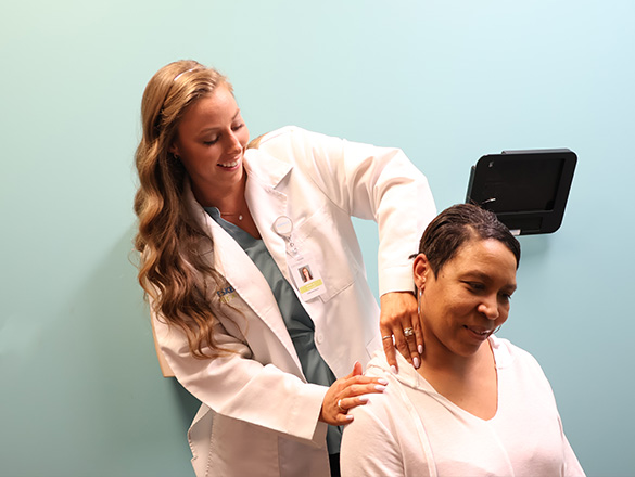 Chiropractor working on a patient's neck