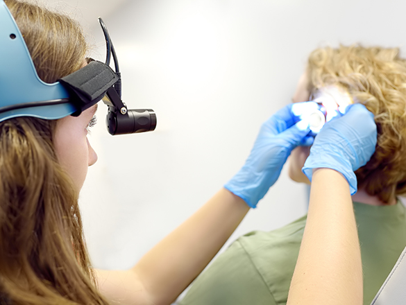 A provider examines a patient