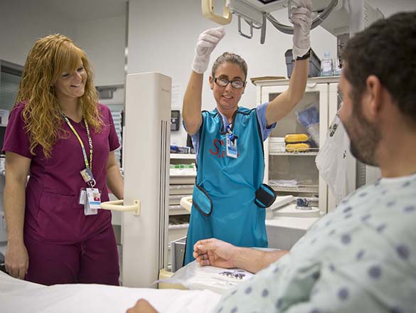 Emergency room staff getting ready to take x-ray