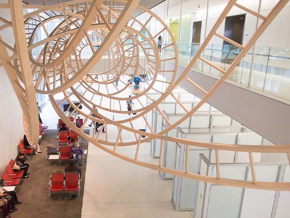 Paths Crossed artwork hanging in the Sidney & Lois Eskenazi Hospital