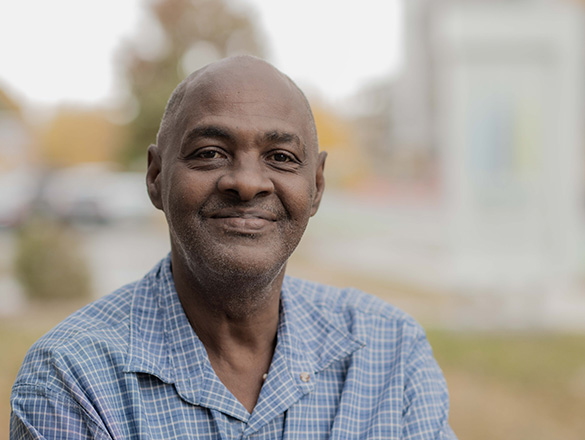 A man smiling at the camera